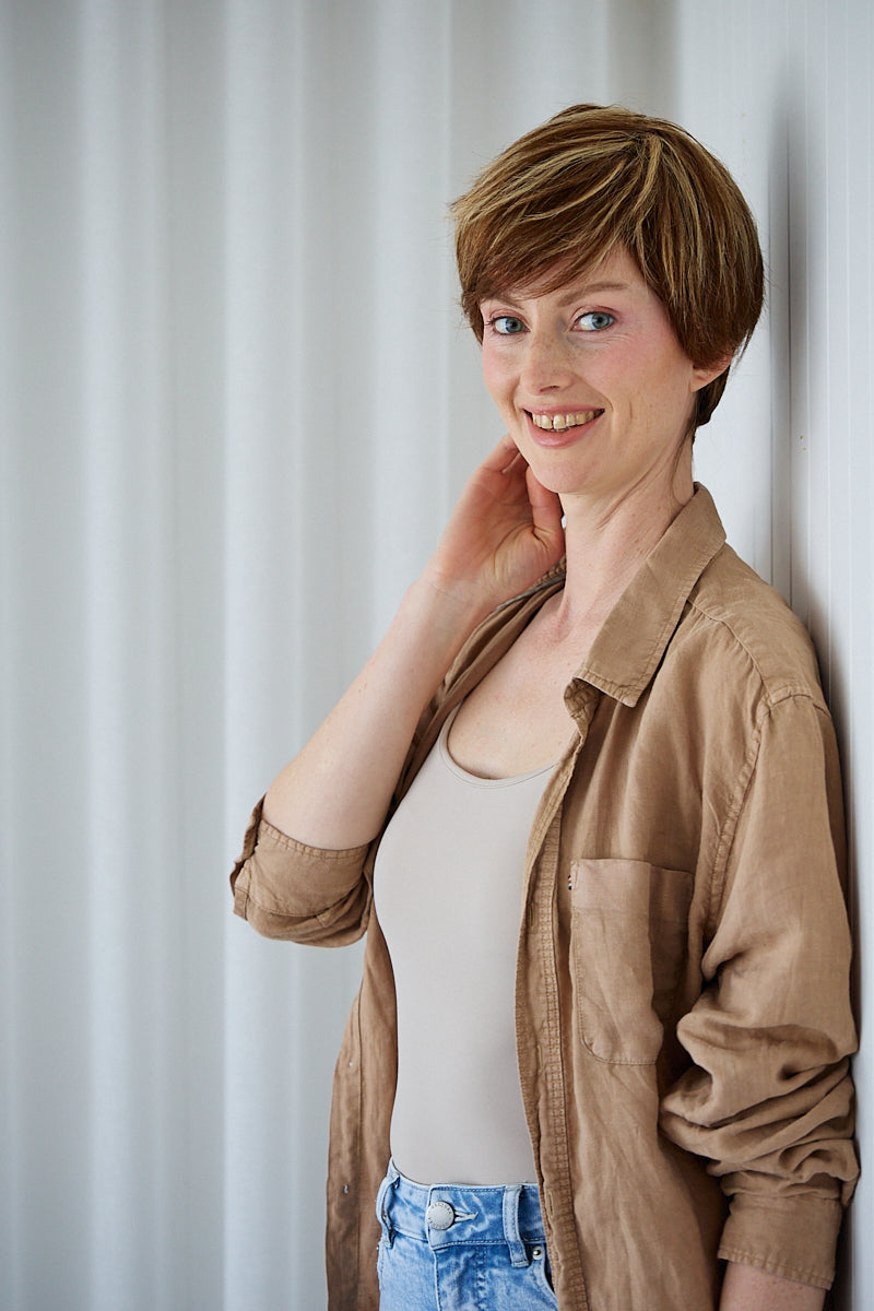 Audrey short layered brunette pixie wig with golden highlights