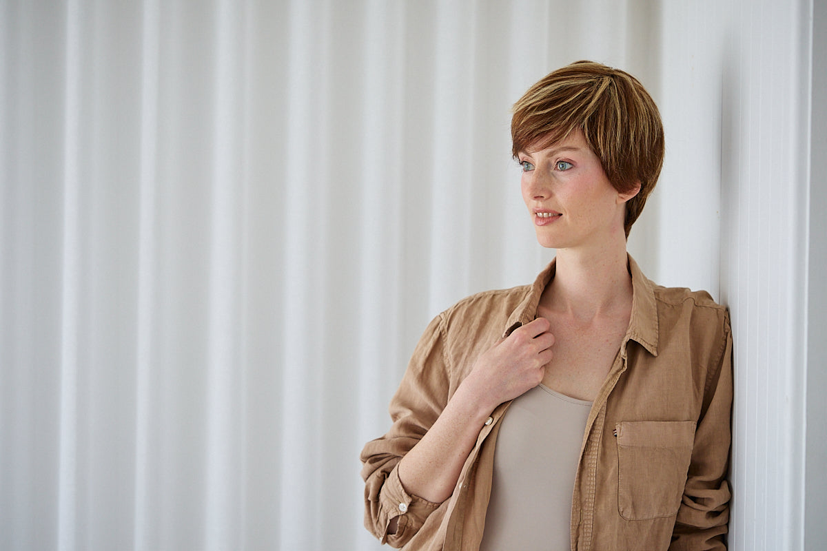 Audrey brunette pixie wig showing side profile and tapered nape